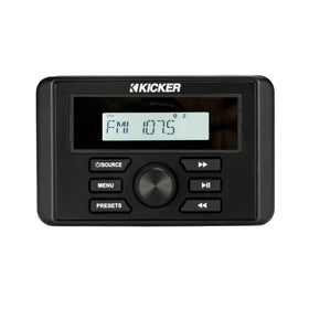 KICKER KMC3 gauge-style media center installed on boat dash for quick Bluetooth streaming.