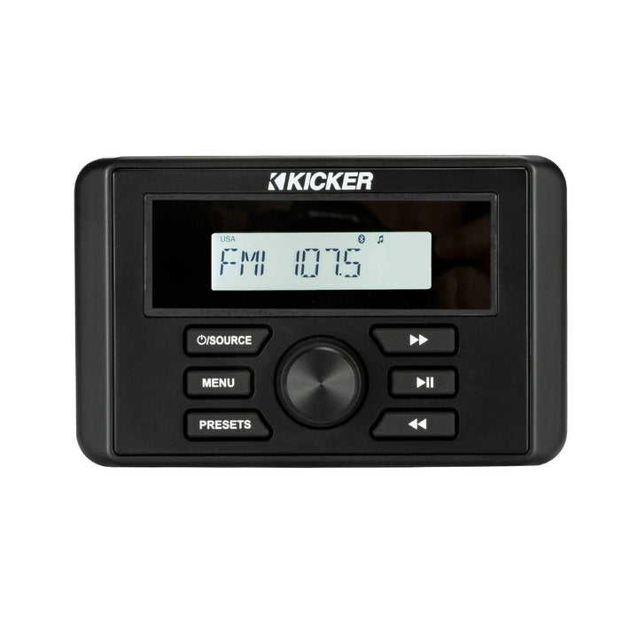 KICKER KMC3 gauge-style media center installed on boat dash for quick Bluetooth streaming.