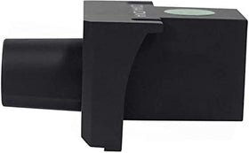KICKER remote beside a hand and coin to show scale and compact footprint