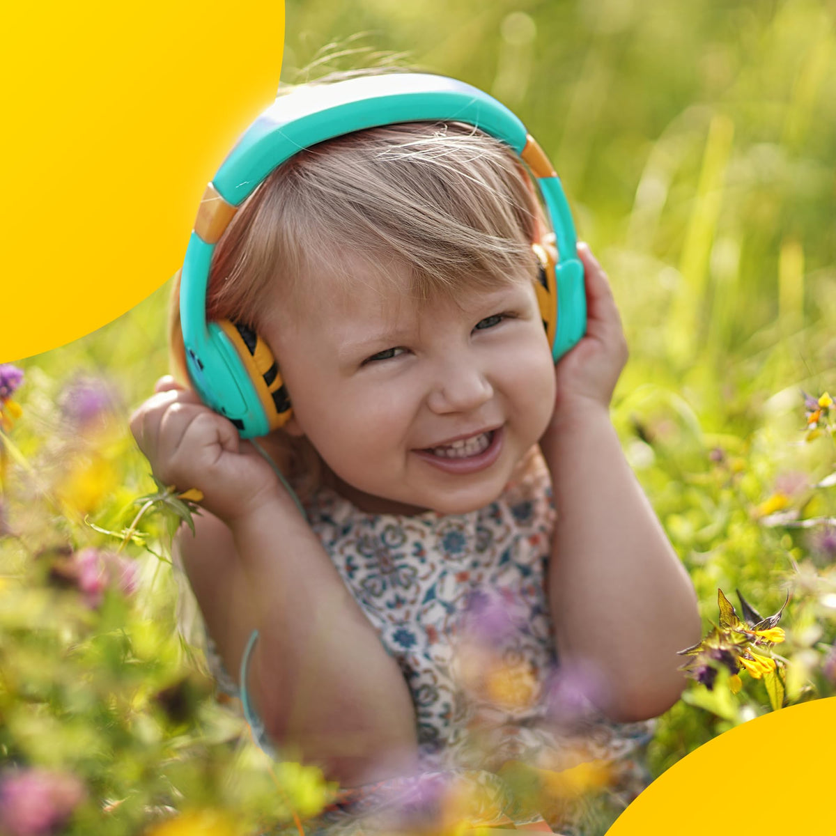 Kidrox headphones beside toy showing size and scale for toddlers