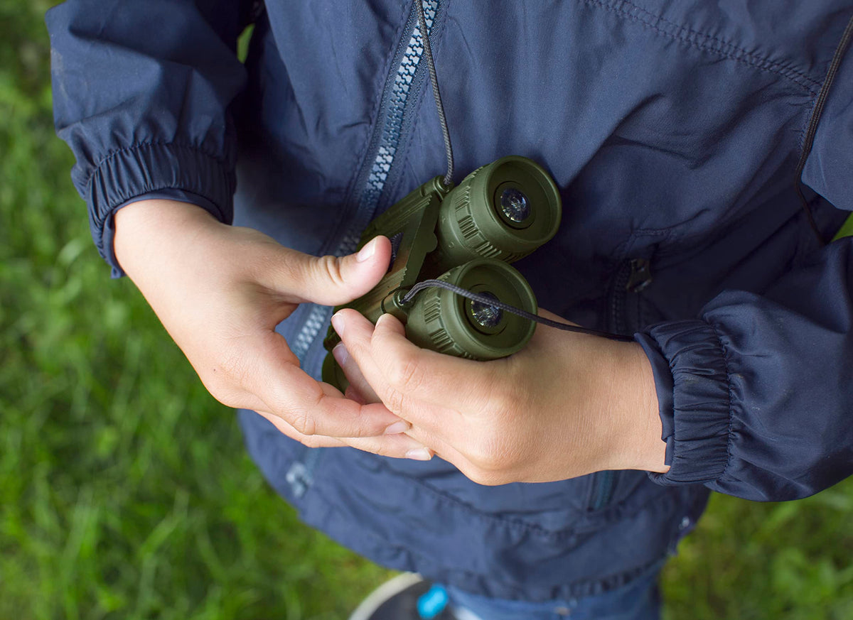 Kikkerland Huckleberry held in hand demonstrating scale and easy carrying benefit