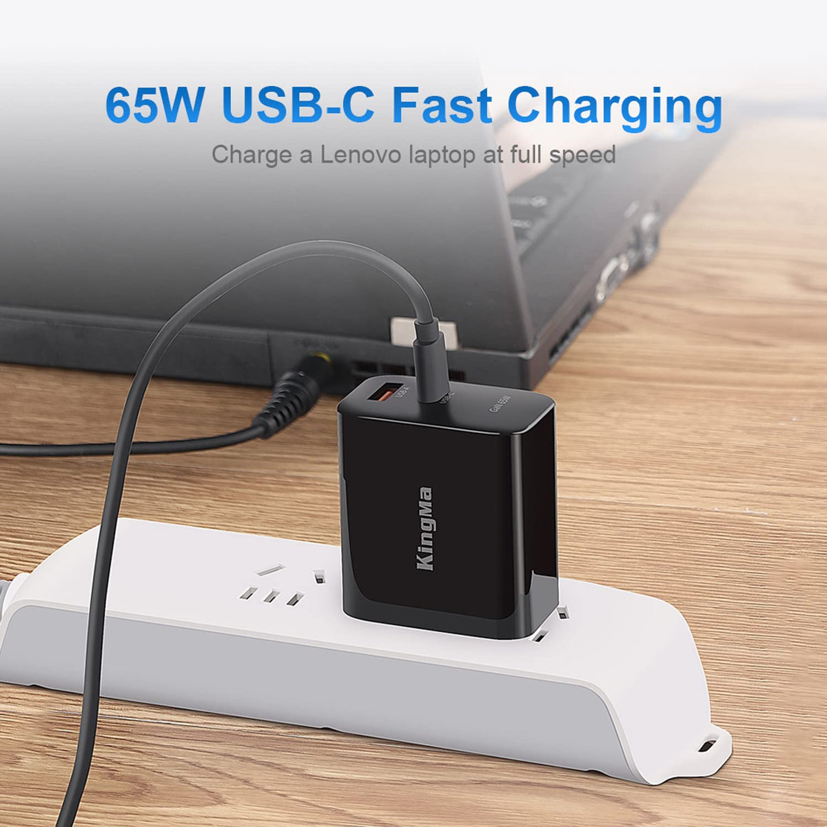 King Ma charger connected to laptop with 1.5m cable delivering reliable power on desk