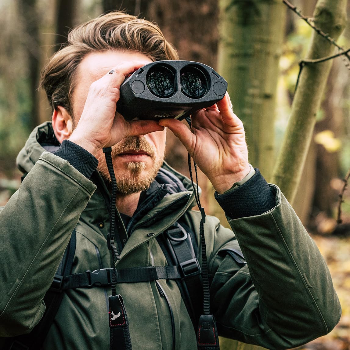 Kite Optics APC Stabilized 18x50 binoculars with an ergonomic grip for comfortable handling.