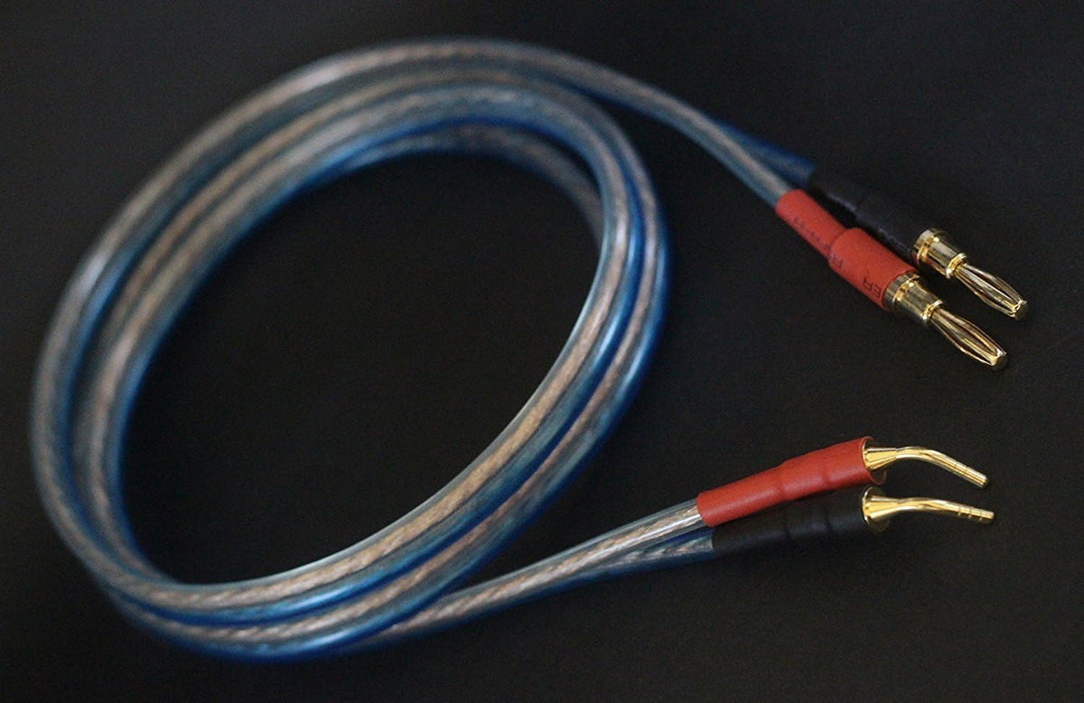 KK Cable closeup of 24k gold‑plated banana and pin connectors for reliable contact