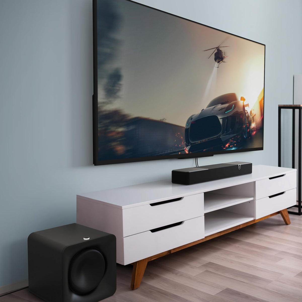 Klipsch Flexus Sub 100 living room scene demonstrates immersive bass with Flexus bars