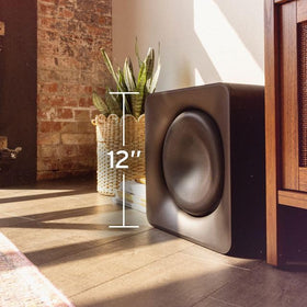Klipsch Flexus Sub 200 beside Flexus bar illustrating cohesive sound pairing