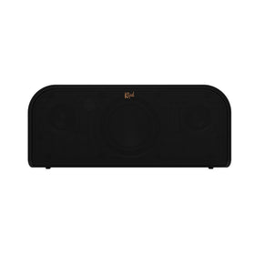 Klipsch Groove XXL on a beach scene delivering clear outdoor sound.