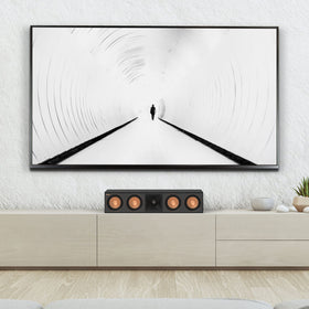 Klipsch RP-504C II walnut larger Tractrix horn enhances speech clarity.