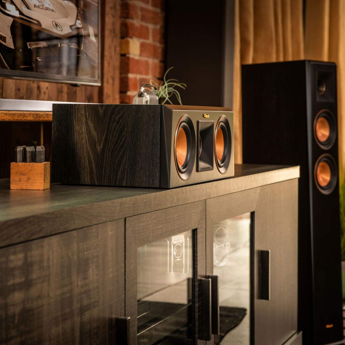 Klipsch RP-500C center speaker side angle showing slim cabinet for compact spaces