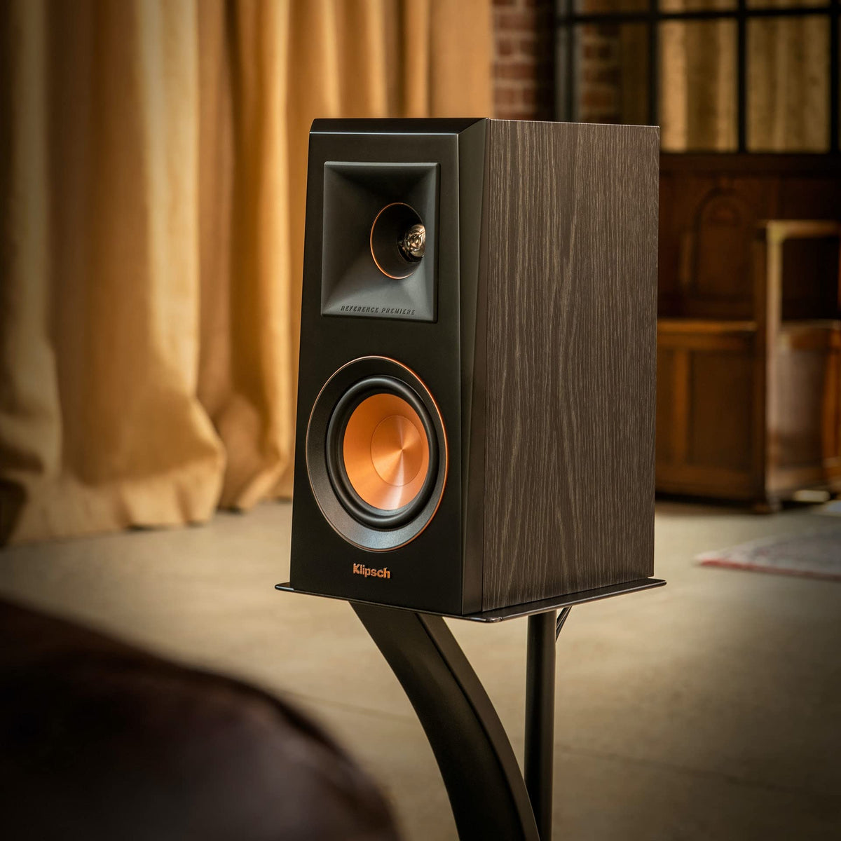 Klipsch RP-600M side view in Ebony finish, slim profile suited for shelves or stands.
