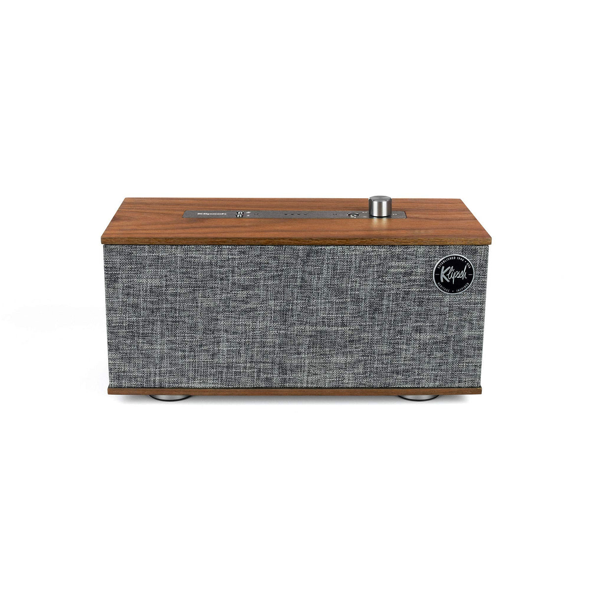 Walnut side panel detail highlighting premium craftsmanship on The One