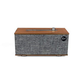 Walnut side panel detail highlighting premium craftsmanship on The One
