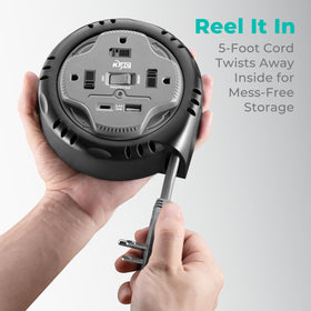 KMC gray compact reel fits beside furniture for discreet power access.