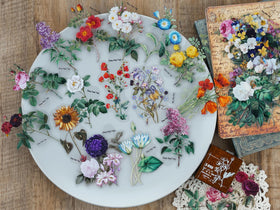 Knaid botanical sticker with clear border enhances scrapbooks with vivid detail.