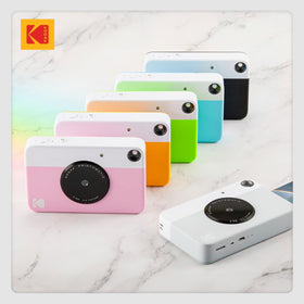 Kodak Printomatic carrying case shown for easy travel and storage.
