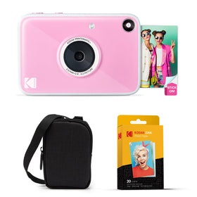 Kodak Printomatic pink front view, compact instant camera for quick memories