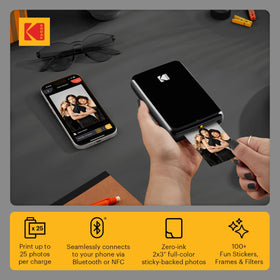 KODAK Step printer paired with a smartphone demonstrates seamless Bluetooth/NFC pairing for quick prints.