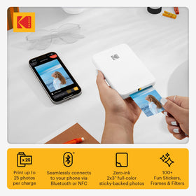 Kodak Step Slim in-hand use highlighting pocket-sized portability for travel photography