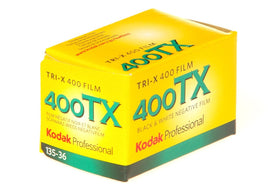 KODAK Tri‑X negatives on lightbox highlighting fine grain and detail for scanning