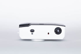 Detail of 31mm lens on Kodak Ultra F9 for quick focus-free shots.