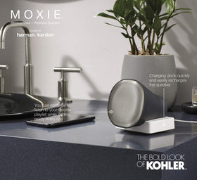 Kohler Moxie in a contemporary bathroom setting with spa-like ambiance.