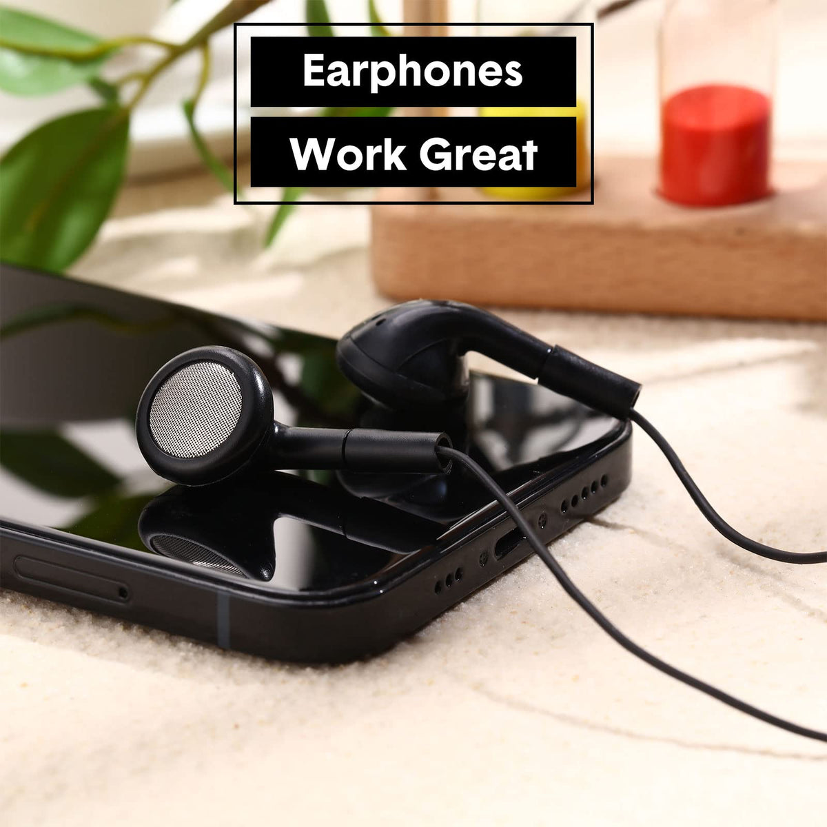 Konohan earbud beside a ruler to show compact size and easy storage for supplies