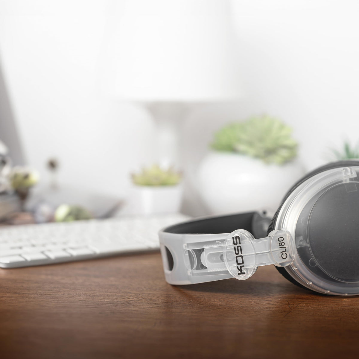Koss CL‑80 in use on child enjoying wireless audio for learning and play