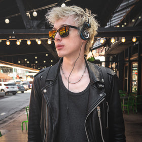 Koss Porta Pro in use lifestyle showing on-ear fit for daily listening