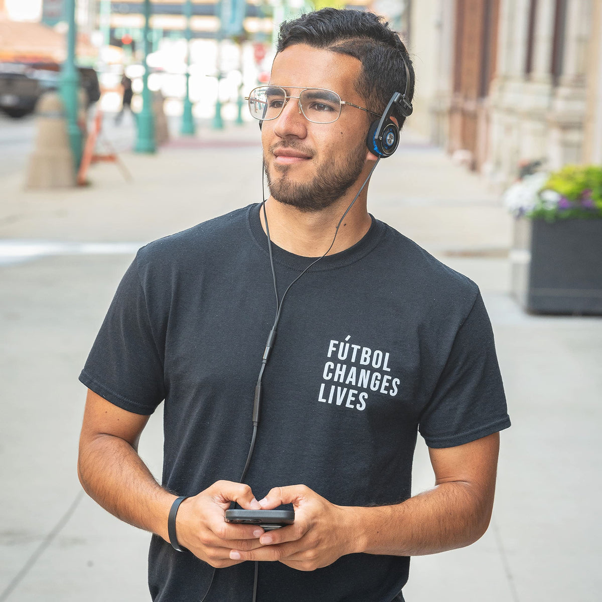 Koss Porta Pro Utility carry pouch with headphones demonstrating protected transport and organization