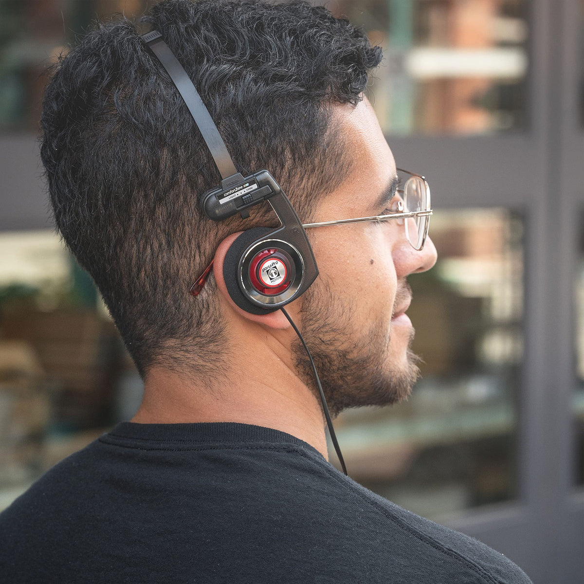 Koss Porta Pro Utility worn by commuter showcasing lightweight comfort and on-the-go listening