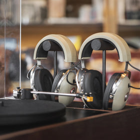 Koss Pro4AA over-ear headphones side view in beige, designed for immersive mixing and focus.