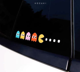 KOZUKI Pac-Man on gaming shelf creating nostalgic atmosphere