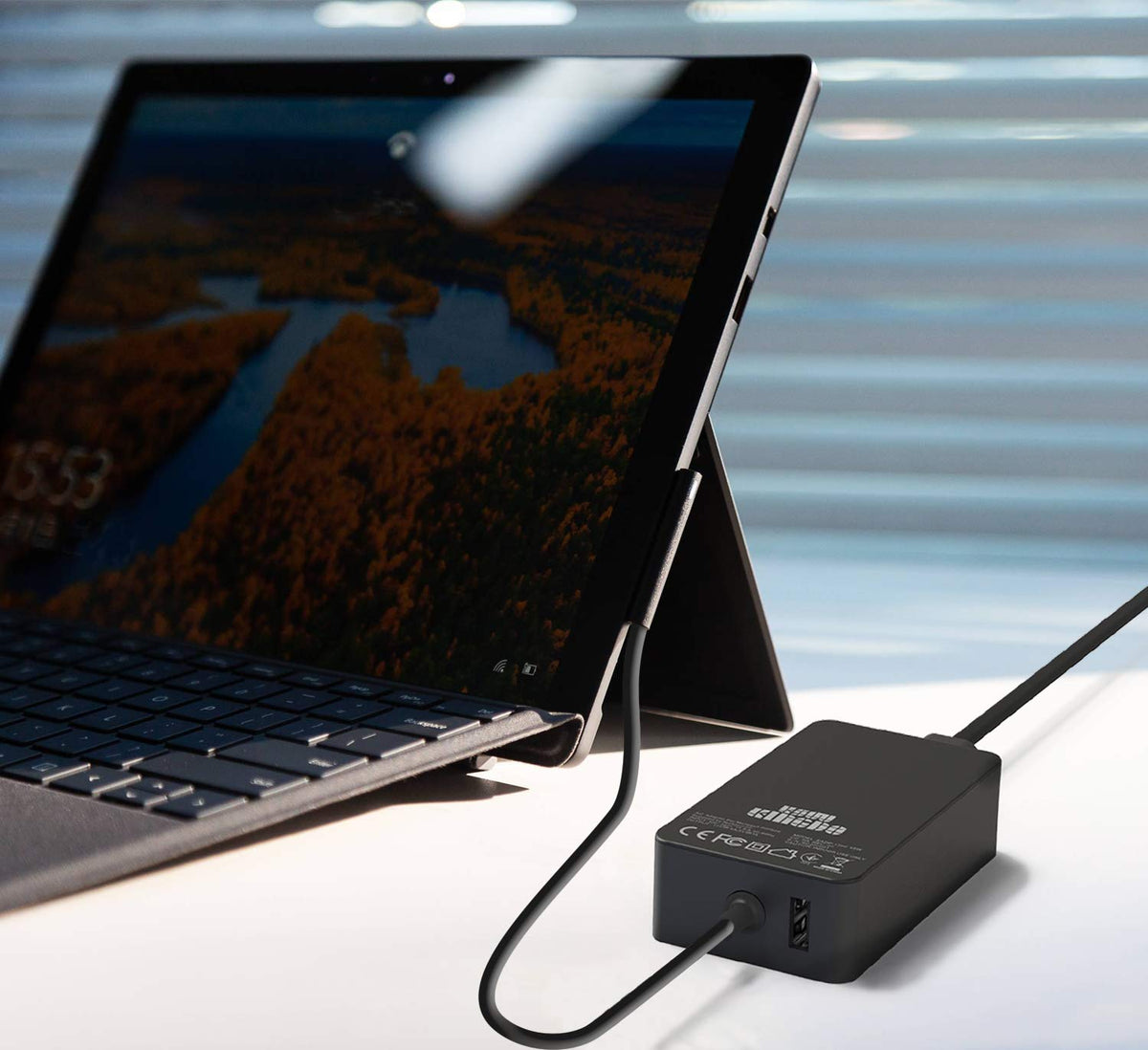 Charger in use with a Surface device demonstrating real-world charging