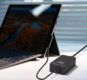 Charger in use with a Surface device demonstrating real-world charging