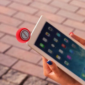 KTech A5 on a table delivers loud, clear sound in a tiny frame.