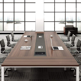Kungfuking installed in conference room table keeping cords hidden and surfaces tidy