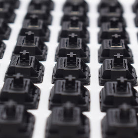 Kutethy Gateron Oil King switches highlight the gold contact point for consistent actuation.