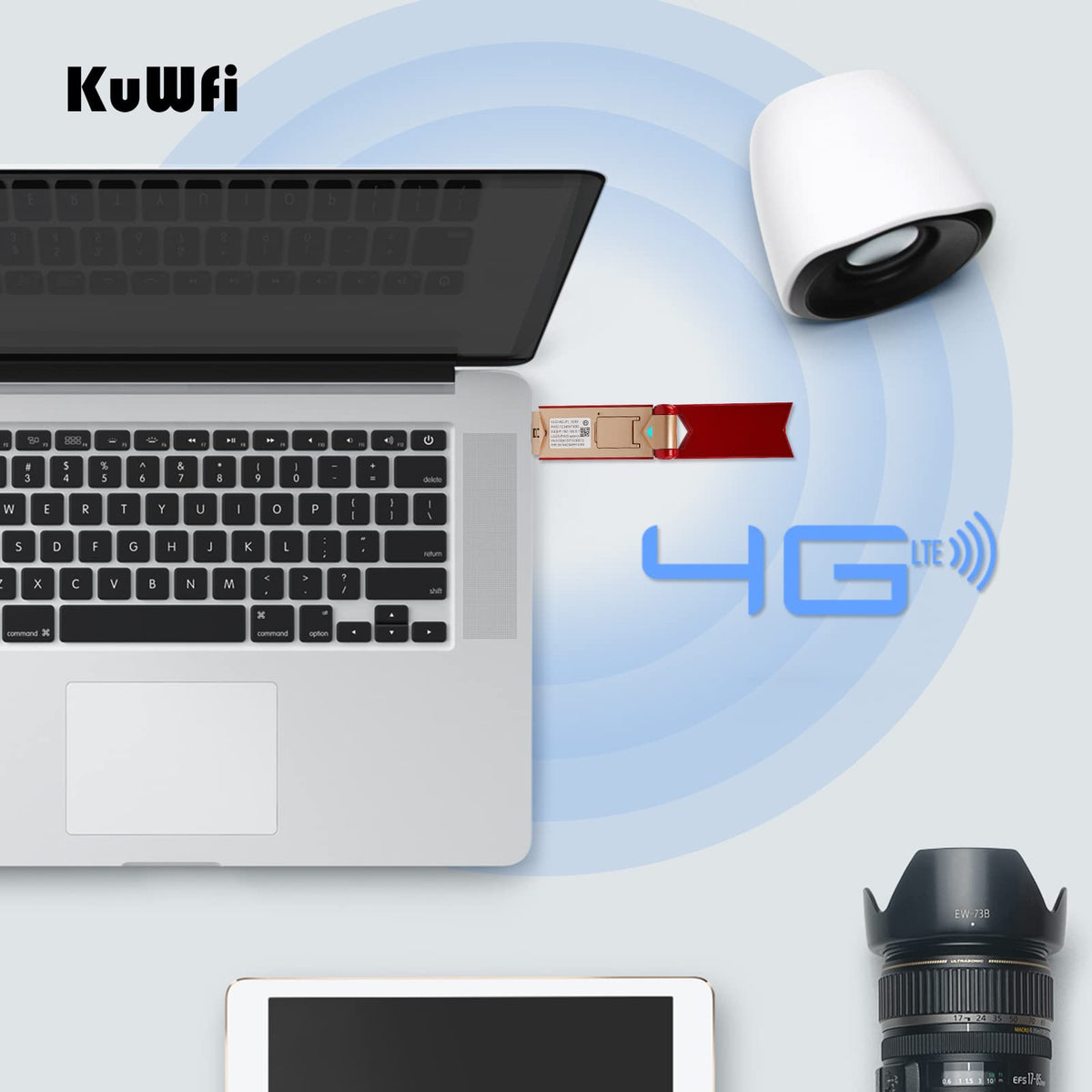 KuWFi plugged into laptop providing fast WiFi to computer and nearby devices