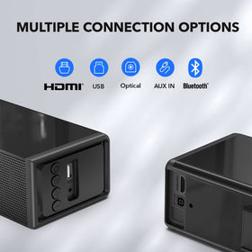 LARKSOUND placed under TV on stand to show compact size and unobtrusive fit