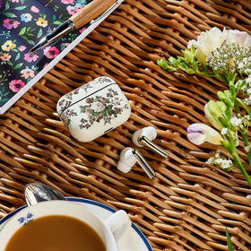 Laura Ashley Skylark closed charging case highlighting compact storage and on-the-go power