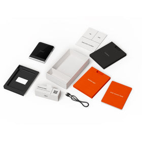 Ledger multi-device sync graphic shows Ledger Sync across devices.