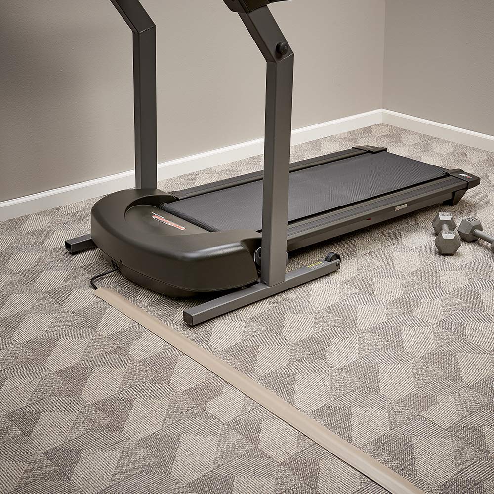 Pressure-sensitive backing sticks securely to indoor floors for lasting coverage.