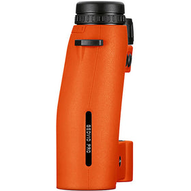 Leica Geovid Pro 10x42 Orange Edition field use in tall grass for quick visibility.