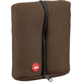 Leica Trinovid HD 10x32 binoculars compact design fits in bags for travel and hiking.