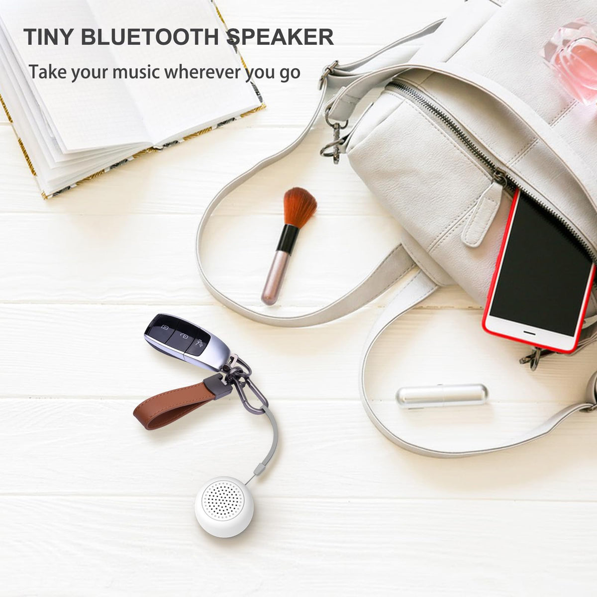 LEICEX wireless speaker ready to attach to a keychain for easy access