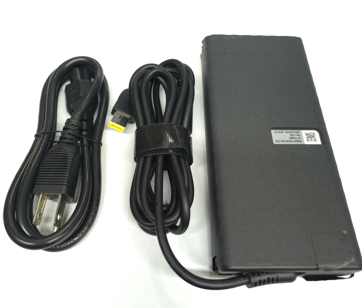 Lenovo 245W Slim Tip port visible, enabling compact gaming setup