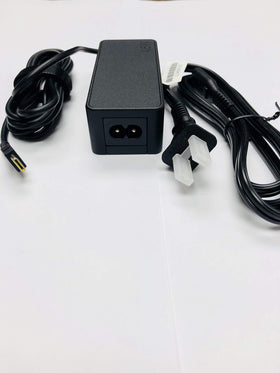 Lenovo 45W USB-C AC adapter in use, powering a ThinkPad via USB-C charging.