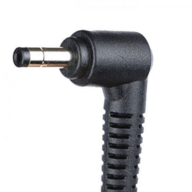 Lenovo adapter plugged into laptop on desk illustrating portability and dependable charging