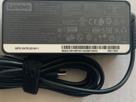 Lenovo 65W USB-C charger in use powering ThinkPad Yoga Flex Miix.