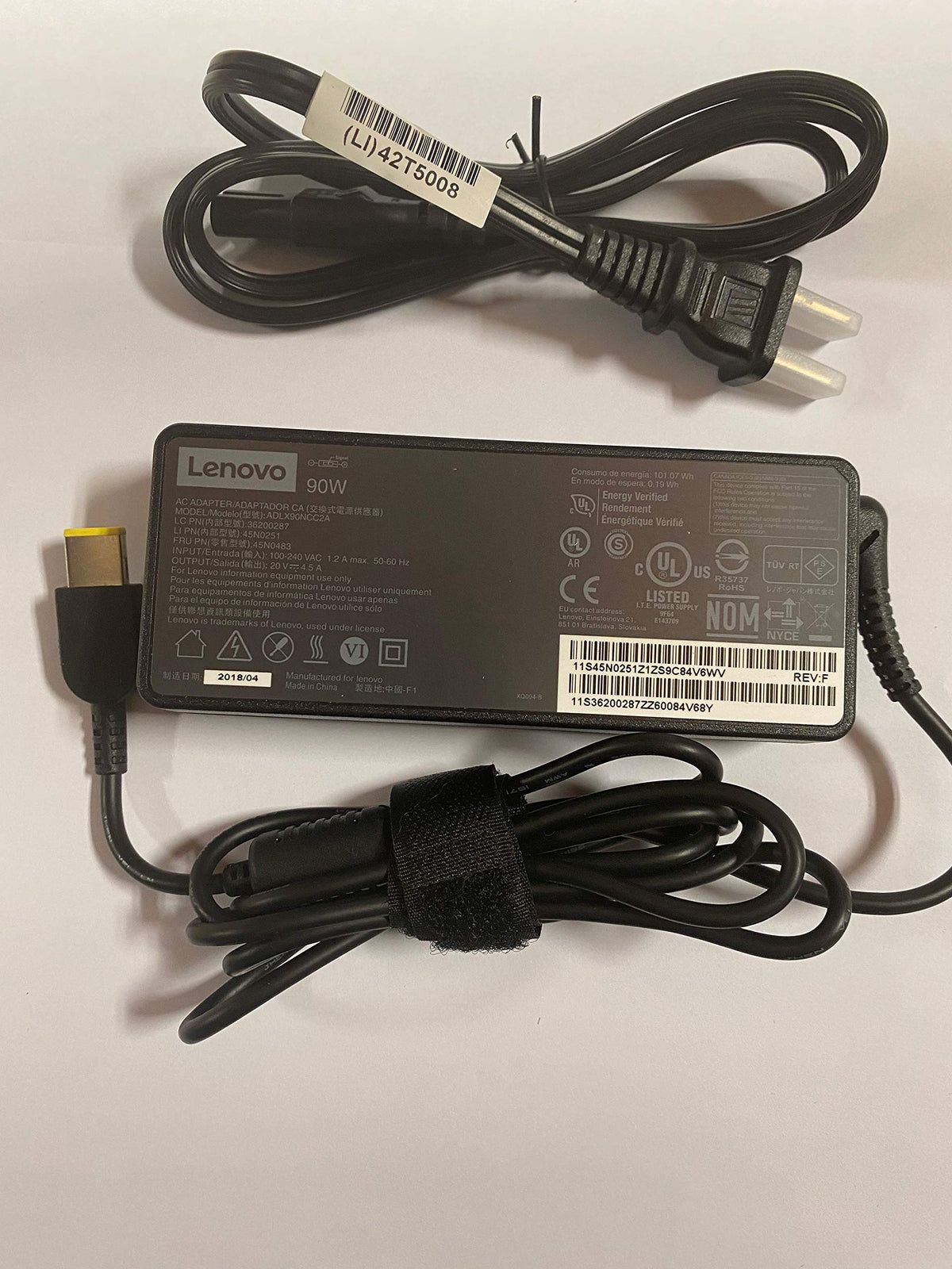 Lenovo 90W Slim Tip adapter side ports showcase durable build.